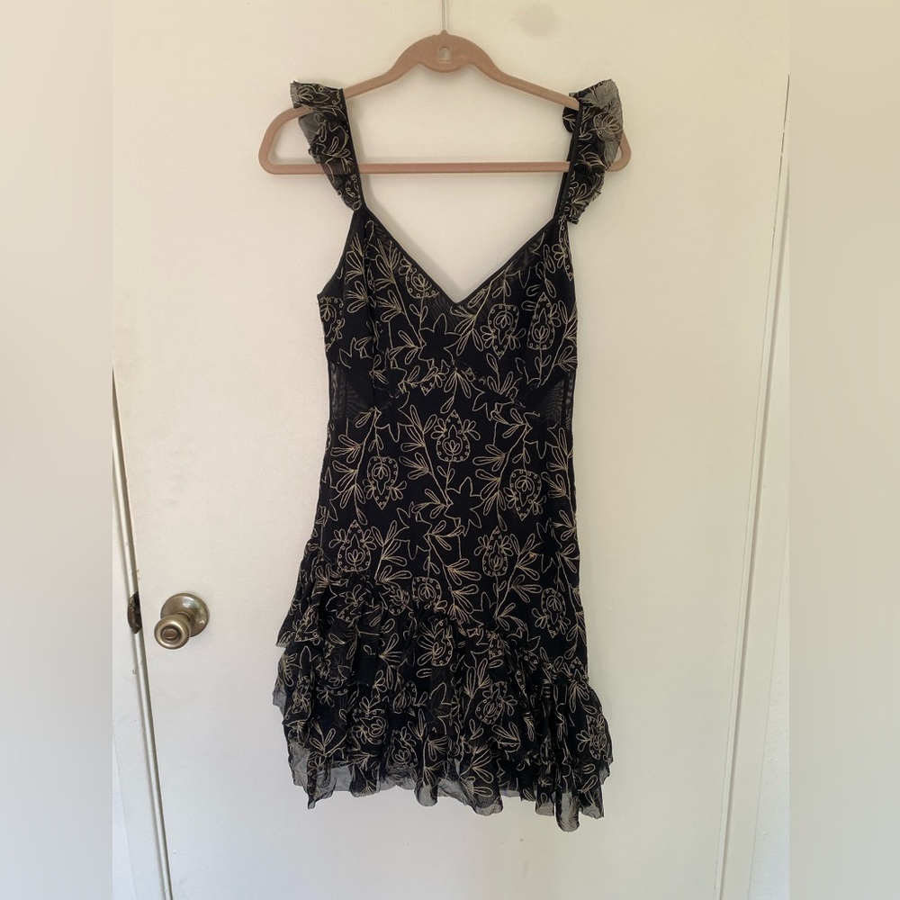 Black and Gold Embroidered Mini Dress with ruffled bottom and sleeves